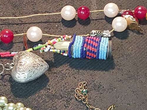 A COLLECTION OF VINTAGE TURQUOISE AND OTHER COSTUME NECKLACES SOLD AS IS