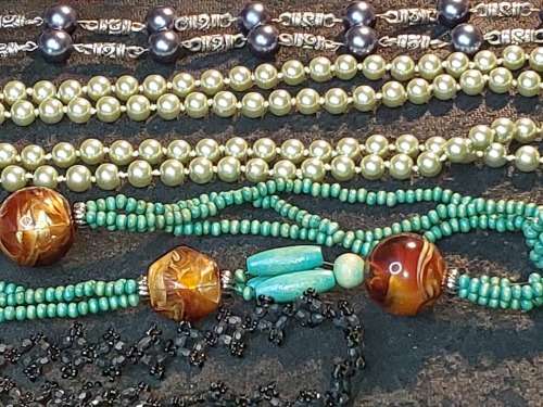 A COLLECTION OF VINTAGE TURQUOISE AND OTHER COSTUME NECKLACES SOLD AS IS