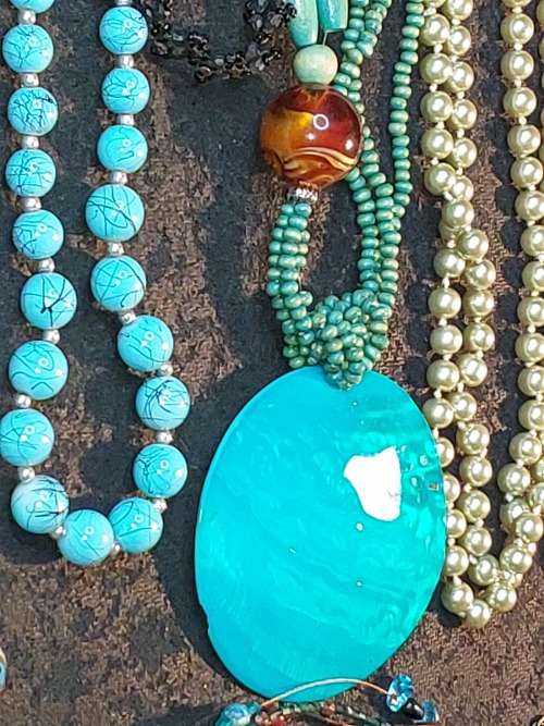 A COLLECTION OF VINTAGE TURQUOISE AND OTHER COSTUME NECKLACES SOLD AS IS