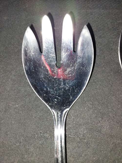 A JOBLOT STAINLESS STEEL SALAD TONGS AND LADELS SOLD AS IS