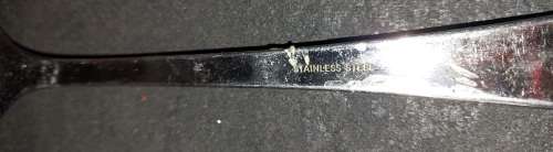 A JOBLOT STAINLESS STEEL SALAD TONGS AND LADELS SOLD AS IS