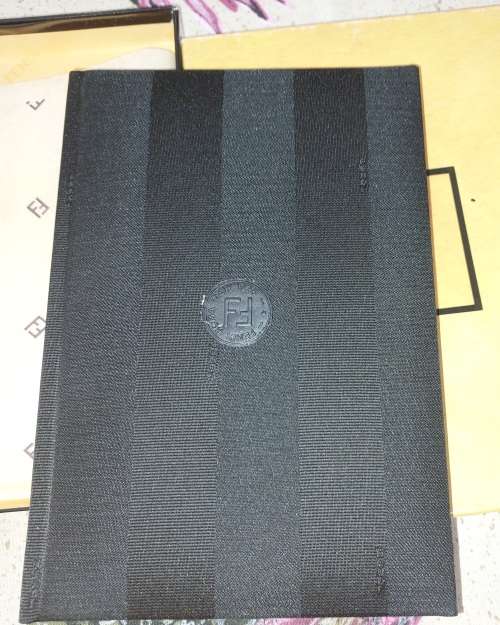 A COLLECTORS FENDI ADDRESS BOOK IN GREAT CONDITION SOLD AS IS