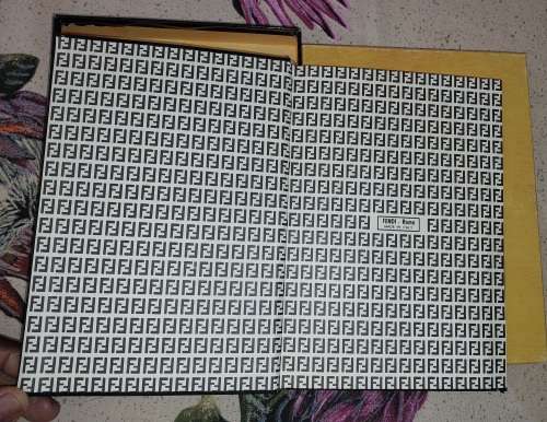 A COLLECTORS FENDI ADDRESS BOOK IN GREAT CONDITION SOLD AS IS