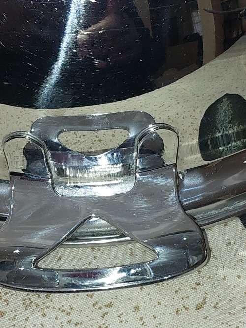 A VINTAGE STAINLESS STEEL SOUP TURINE WITH A LADEL