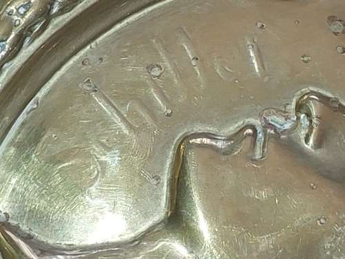 A PAIR OF VINTAGE BRASS WALL PLAQUES SOLD AS IS