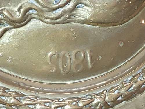 A PAIR OF VINTAGE BRASS WALL PLAQUES SOLD AS IS