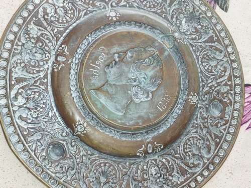 A PAIR OF VINTAGE BRASS WALL PLAQUES SOLD AS IS