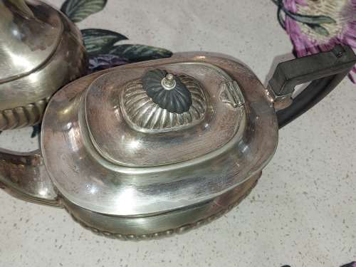 AN ANTIQUE EPNS TEA JUG SET SOLD AS IS