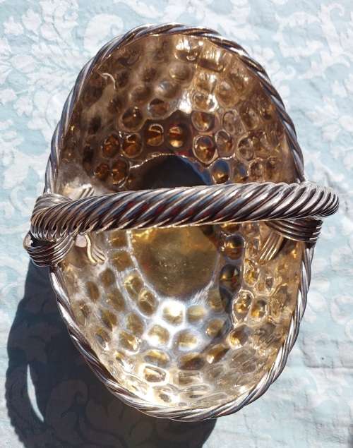A VINTAGE ART DECOR SILVER PLATED ON BRASS SERVING BASKET SOLD AS IS