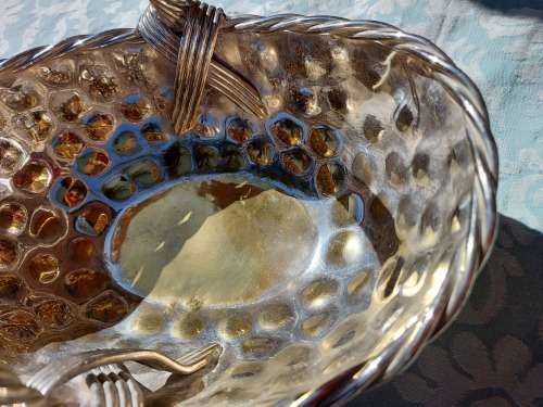 A VINTAGE ART DECOR SILVER PLATED ON BRASS SERVING BASKET SOLD AS IS