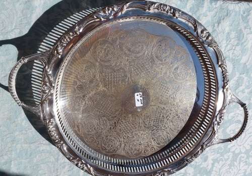 A VINTAGE SERANCO SILVER PLATED ON BRASS 50 CM DIAMETER SERVING TRAY SOLD AS IS