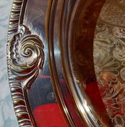 A VICTORIAN STYLE SILVER PLATED SERVING TRAY SOLD AS IS