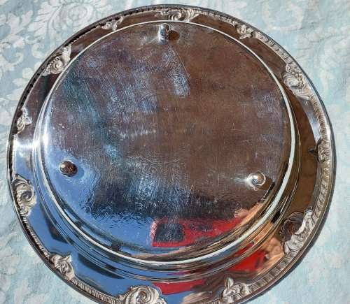 A VICTORIAN STYLE SILVER PLATED SERVING TRAY SOLD AS IS