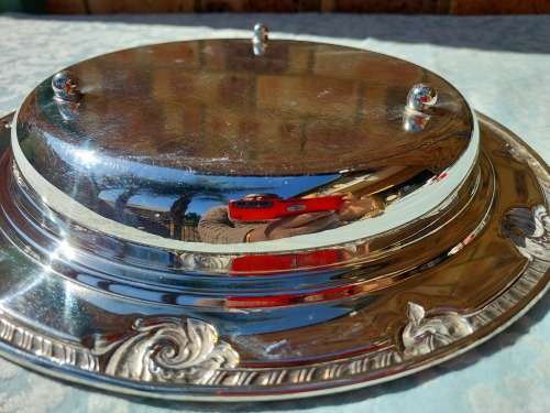 A VICTORIAN STYLE SILVER PLATED SERVING TRAY SOLD AS IS