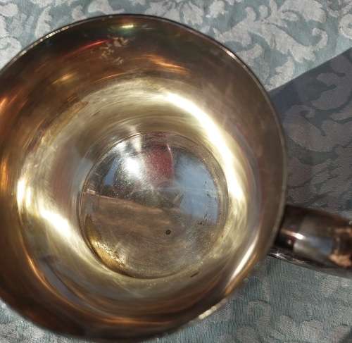 TWO BEER MUGS A SILVER PLATED AND A PEWTER MUG SOLD AS IS
