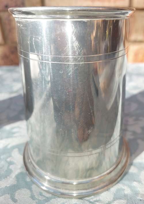 TWO BEER MUGS A SILVER PLATED AND A PEWTER MUG SOLD AS IS
