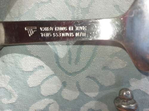 AN ART DECOR PAIR OF ALUMINUM ALLOY HANDLED SALAD TONGS SOLD AS IS