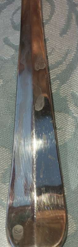 A CLASSIC DESIGNED PAIR OF SALAD TONGS SOLD AS IS
