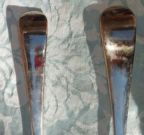 A CLASSIC DESIGNED PAIR OF SALAD TONGS SOLD AS IS