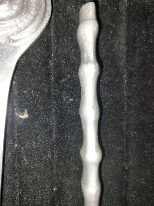 A PAIR OF ALUMINIUM ALLOY SALAD LADELS SOLD AS IS