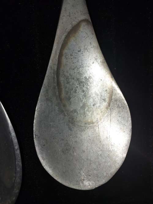 A PAIR OF ALUMINIUM ALLOY SALAD LADELS SOLD AS IS