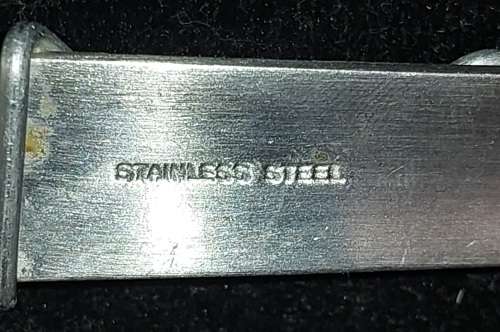 A PAIR STAINLESS STEEL SALAD LADELS SOLD AS IS