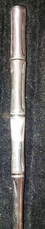 A SET BAMBOO STYLE STAINLESS STEEL SALAD LADELS