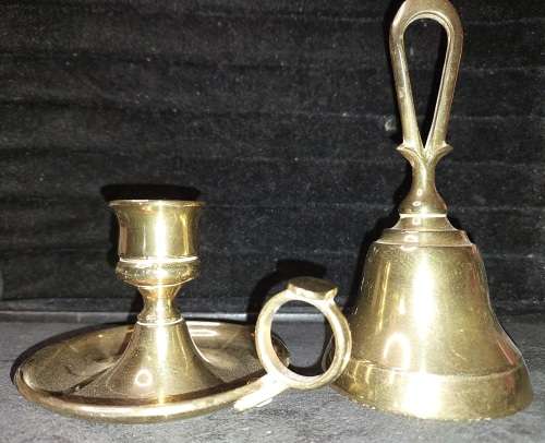 A SOLID HEAVY BRASS CANDLE STAND AND SOLID BRASS BELL