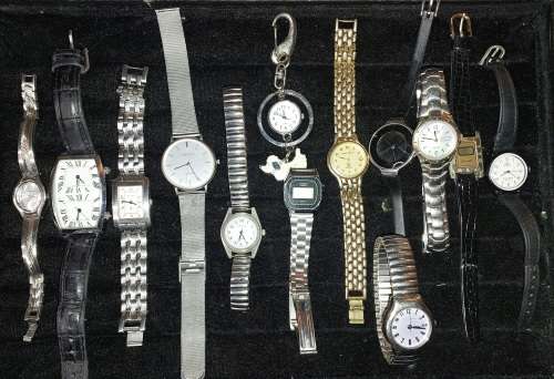 A bulk collection of quality costume quartz watches sold as is not tested