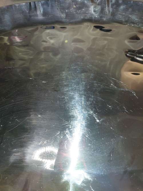 AN ART DECOR OVAL 55 X 39 CENTIMETER HAMMERED  STAINLESS STEEL SERVING TRAY
