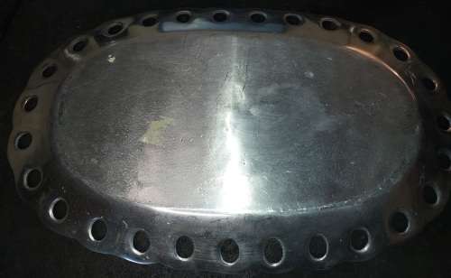 AN OVAL 52 X32 CENTIMETER ALUMINUM ALLOY CAROL BOYES STYLE SERVING TRAY