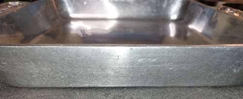 A VINTAGE 27 X 27 CENTIMETER SQUARE MEXICAN PEWTER ALLOY SERVING PLATTER