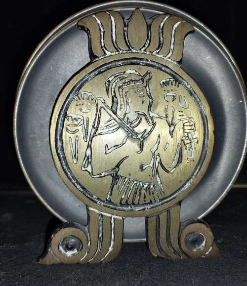 A VINTAGE SET EGYPTIAN PHAROAH BLACK ON BRASS COASTERS