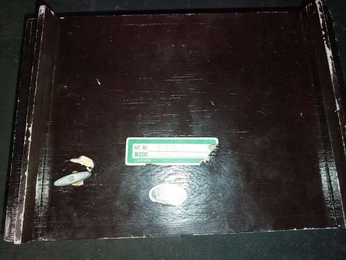 A VINTAGE BURLE WOODEN MUSICAL JEWELRY BOX WITH RED VELVET SOLD AS IS