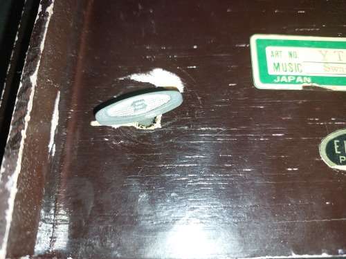A VINTAGE BURLE WOODEN MUSICAL JEWELRY BOX WITH RED VELVET SOLD AS IS