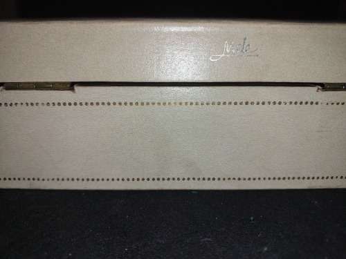 A VINTAGE JEWELRY BOX IN FAIR CONDITION NO KEYS SOLD AS IS