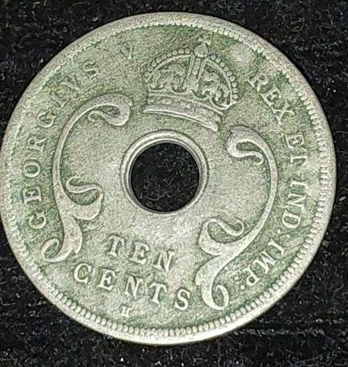 RARE BRITISH ANTIQUE TEN-CENT COIN WITH A SOLDIER`S DETAILS ON THE REVERSE AND A SOUTH AFRICAN HALF