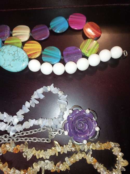 A COLLECTION OF SYNTHETIC BEAD COSTUME NECKLACES