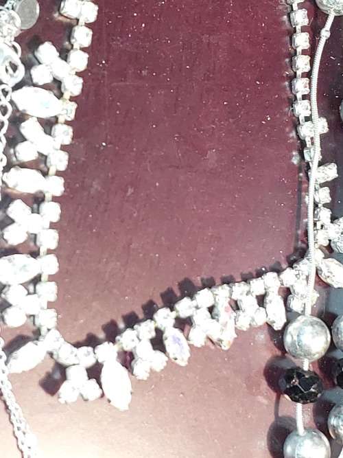 A COLLECTION OF QUALITY DESIGNER COSTUME NECKLACES SOLD AS IS