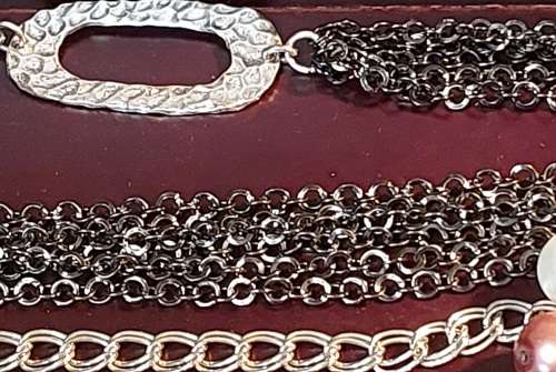 A VINTAGE COLLECTION OF DESIGNER COSTUME NECKLACES