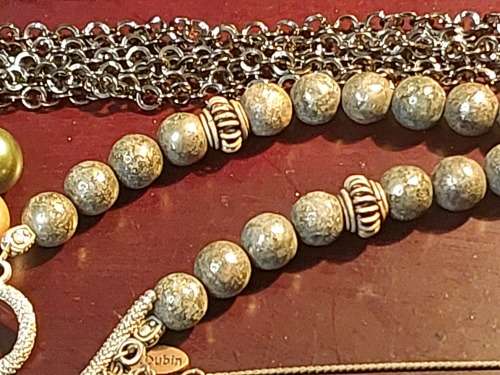 A VINTAGE COLLECTION OF DESIGNER COSTUME NECKLACES