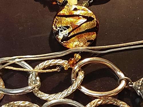 A VINTAGE COLLECTION OF DESIGNER COSTUME NECKLACES