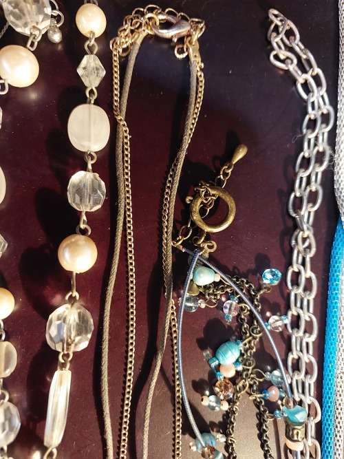 A DESIGNER COLLECTION COSTUME NECKLACES SOLD AS IS