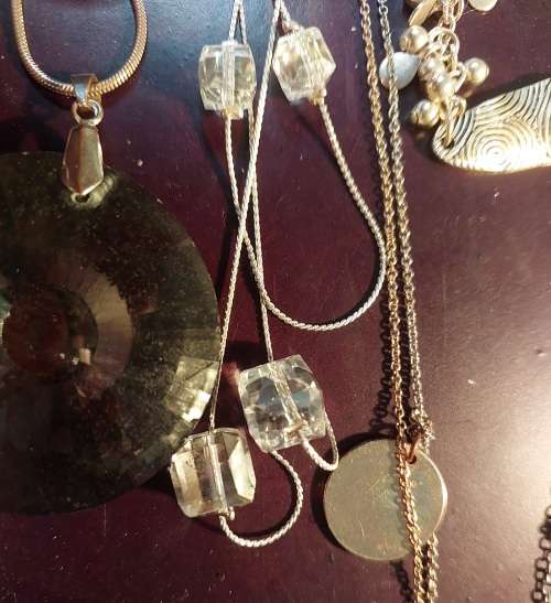 A BULK COLLECTION GOLD PLATED AND SILVER TONE PETIT COSTUME NECKLACES