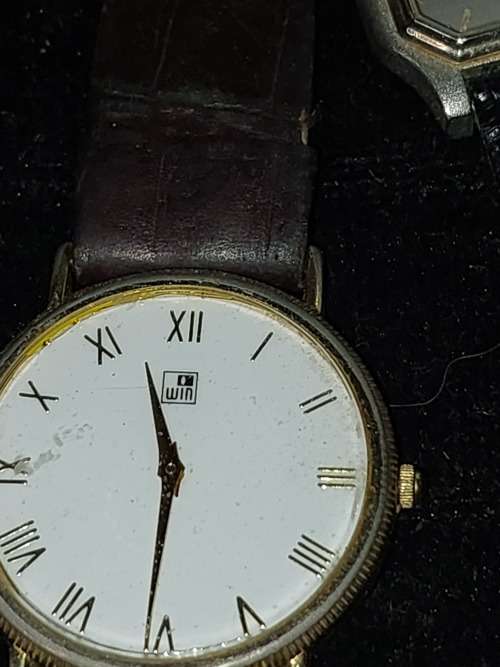 A COLLECTION OF DESIGNER DRESS WATCHES SOLD AS IS NOT TESTED