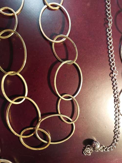 A COLLECTION OF FASHION CHAIN BELTS SOLD AS IS