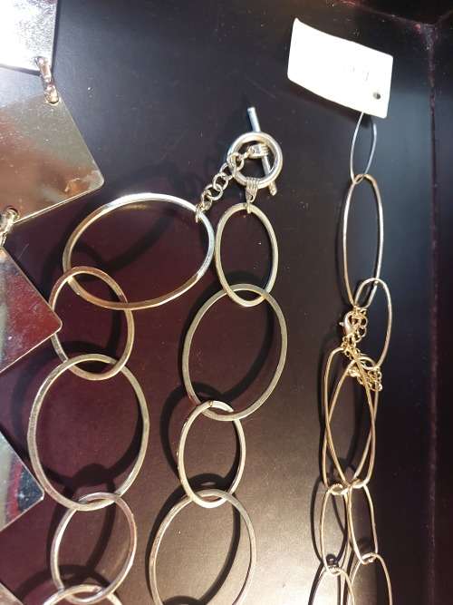 A COLLECTION OF FASHION CHAIN BELTS SOLD AS IS