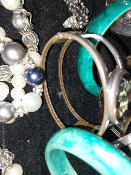 A  BEAUTIFUL COLLECTION OF FASHION BANGLES AND BRACELETS SOLD AS IS