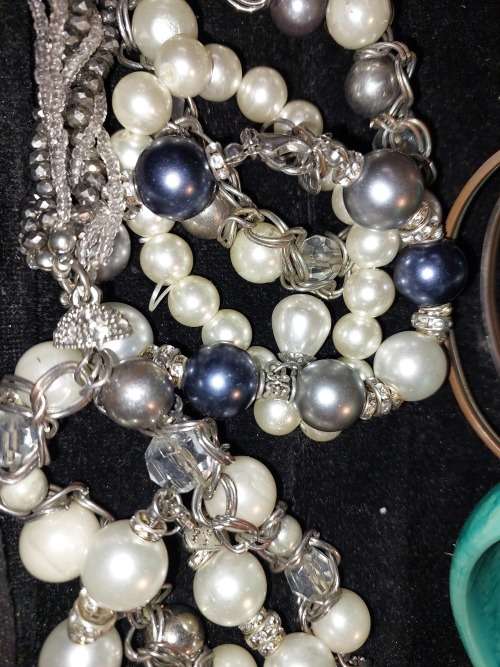 A  BEAUTIFUL COLLECTION OF FASHION BANGLES AND BRACELETS SOLD AS IS
