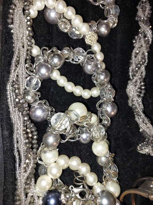 A  BEAUTIFUL COLLECTION OF FASHION BANGLES AND BRACELETS SOLD AS IS